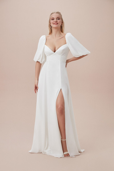 Half balloon sleeved wedding dress with low-cut chest neckline and slit TB1416 Half balloon sleeved wedding dress with low-cut chest neckline and slit TB1416