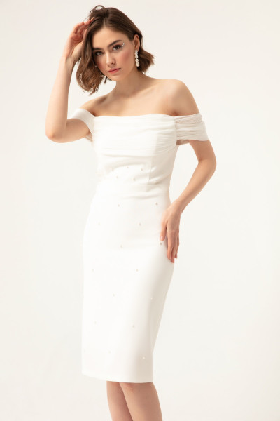 Woman in white pearl-embellished boat neck midi dress TB1503 Woman in white pearl-embellished boat neck midi dress TB1503